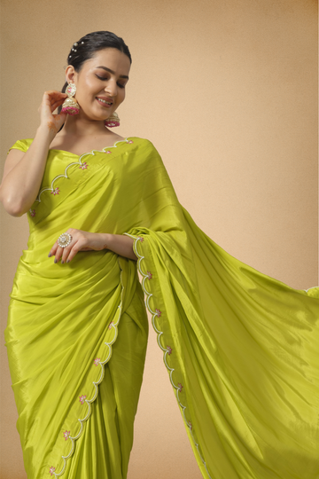 Lime Green Crepe Saree with Scalloped Border and Hand-Embroidered Lotus Motifs