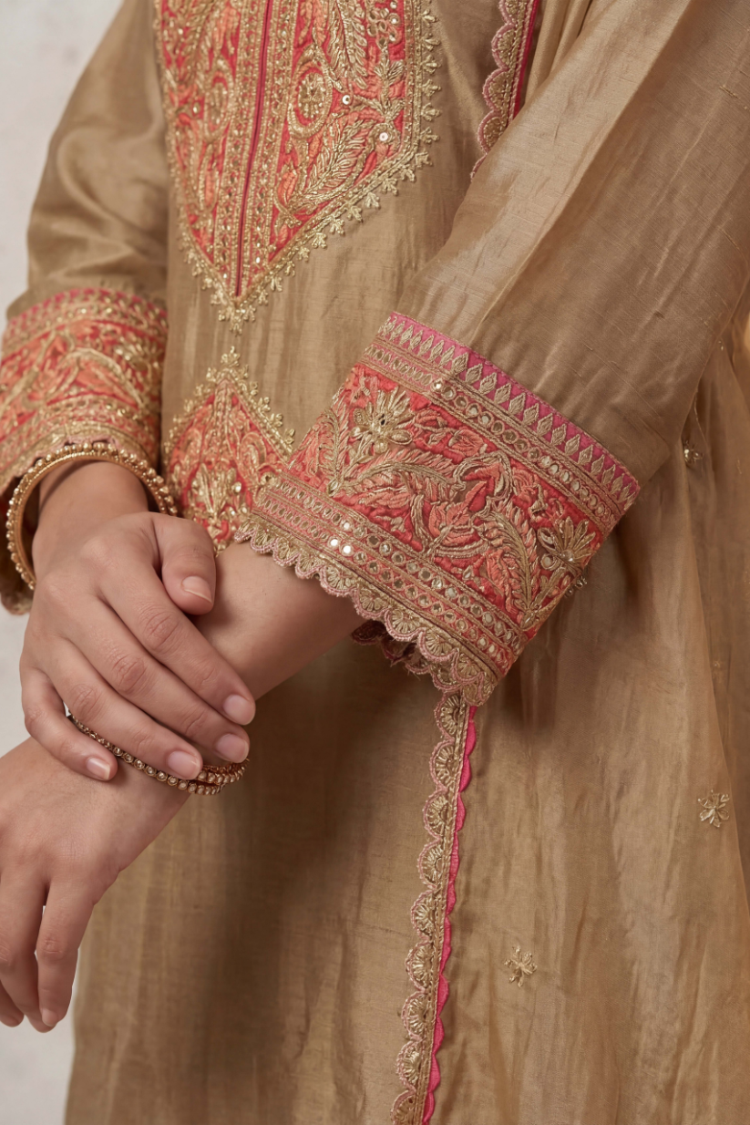 detailed sleeve embroidery in red on antique gold kurta ethnic outfit for women