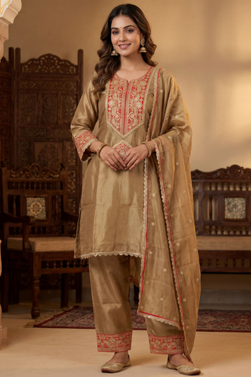 woman wearing antique gold and red embroidered kurta pant set with dupatta front view ethnic festive outfit