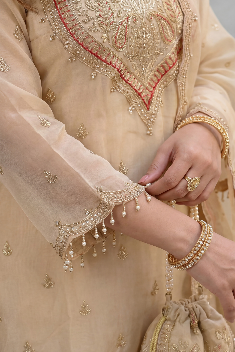 Embroidered sleeve detailing on beige festive kurta
