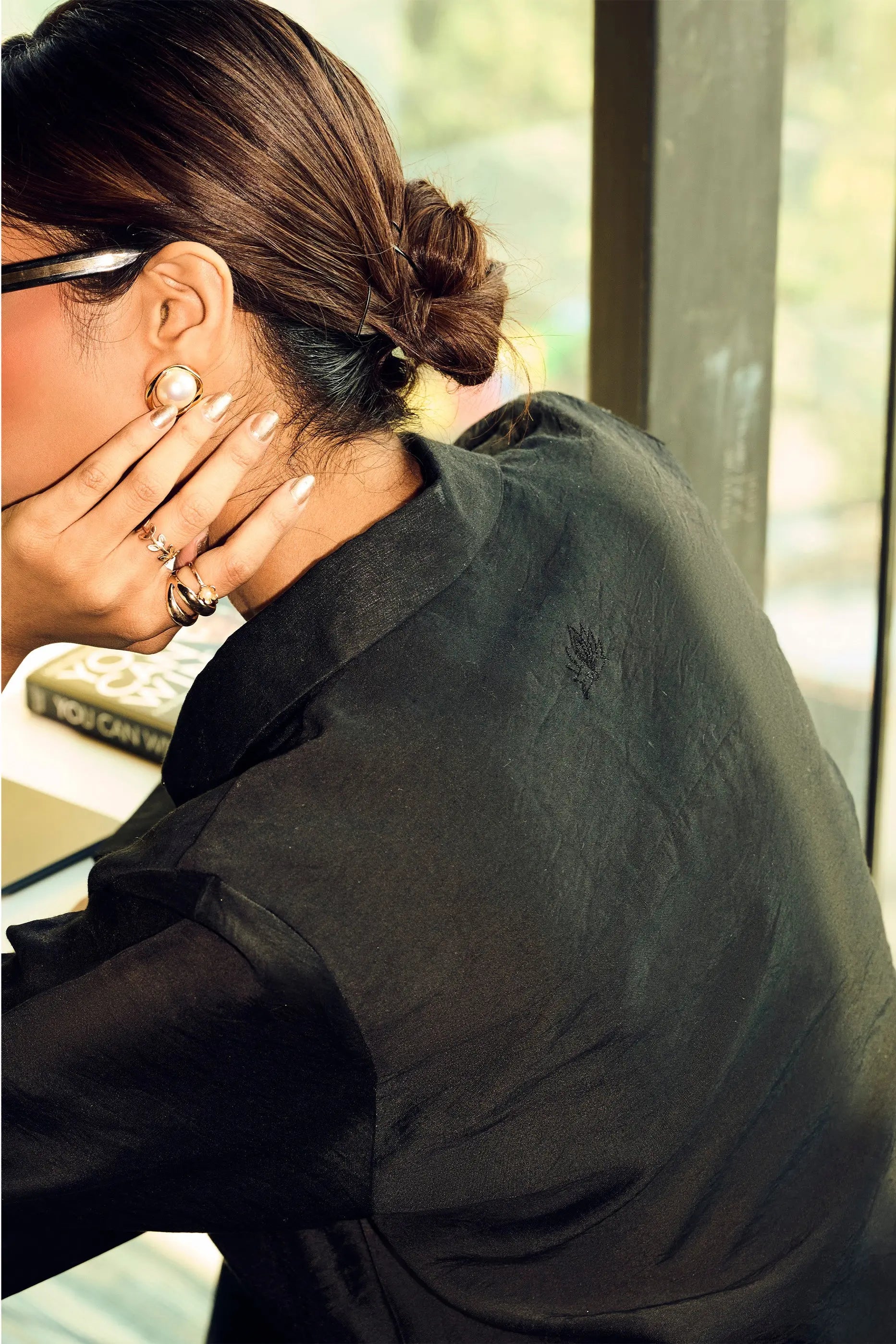 Close-up back view of a black Chanderi regular fit shirt for women styled for elegant office and smart casual wear