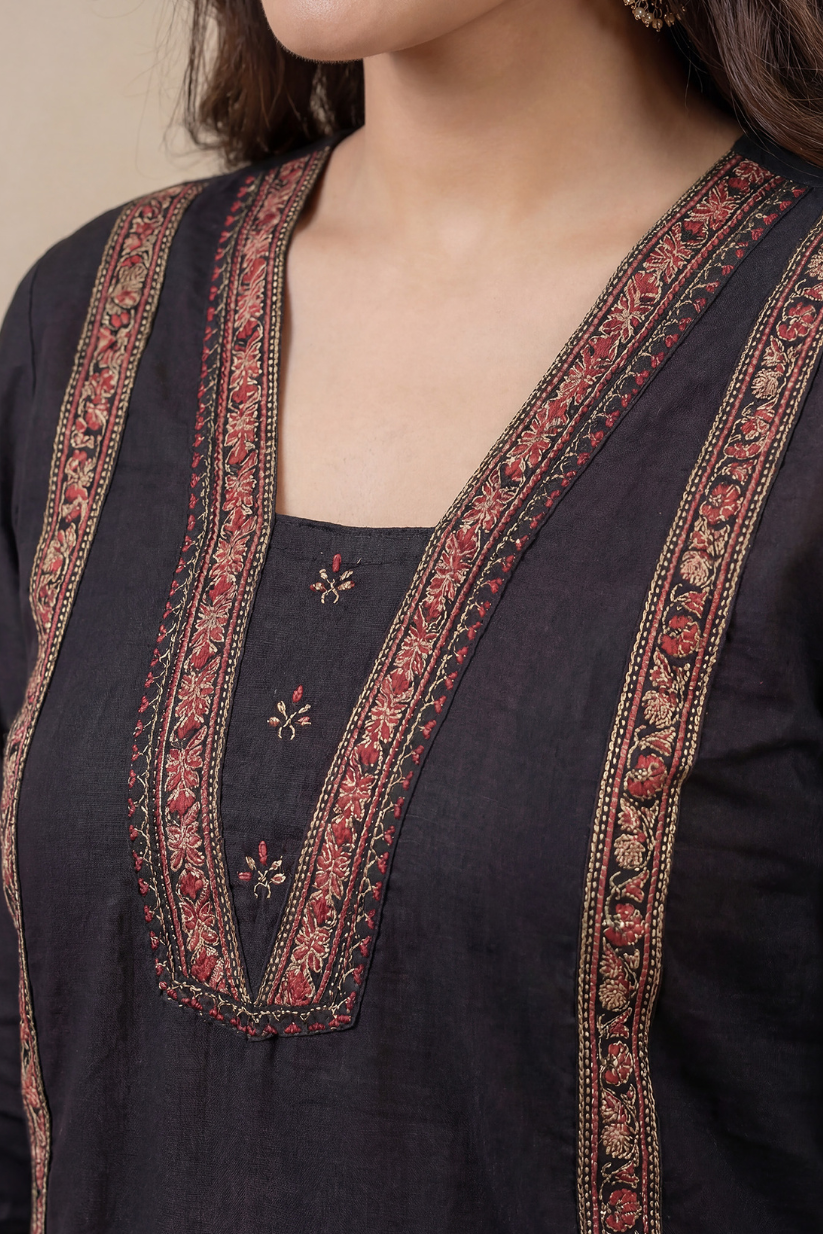 Front view of black cotton A-line kurta set with printed dupatta for women