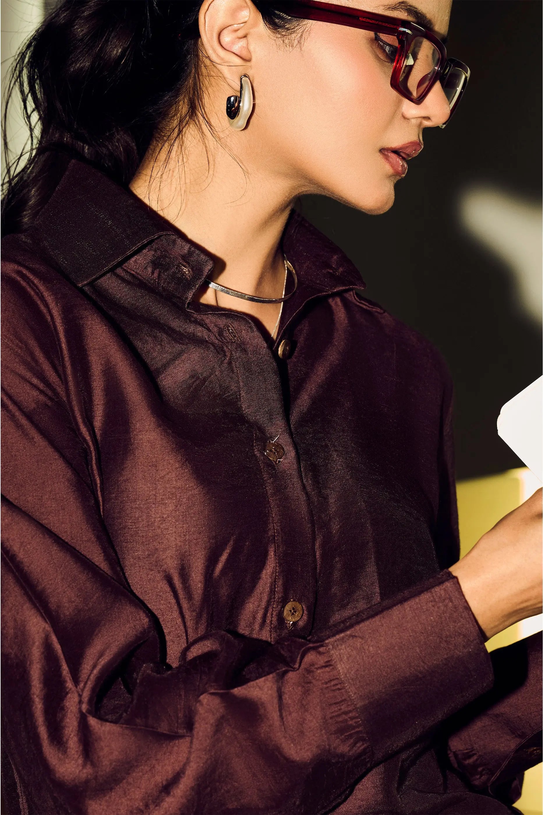 Close-up detail of brown Chanderi shirt fabric and collar design for women
