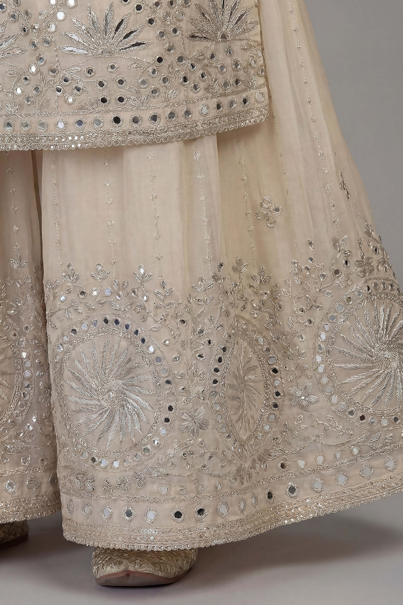 Detailed embroidery design of cream festive palazzo set