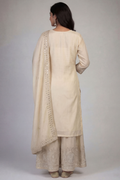 Back view of women cream embroidered palazzo set