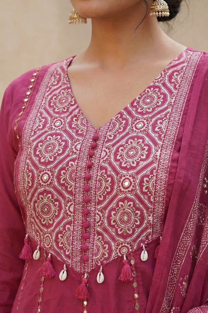 Deep rose pink embroidered Anarkali kurta set with matching dupatta and pants for festive ethnic wear women