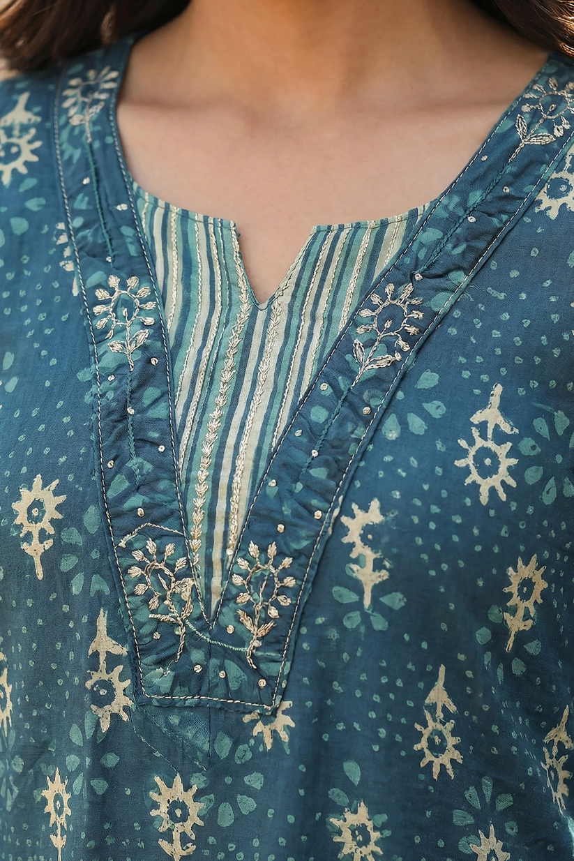 Woman wearing dusty blue printed kurta pant set with dupatta for ethnic festive wear
