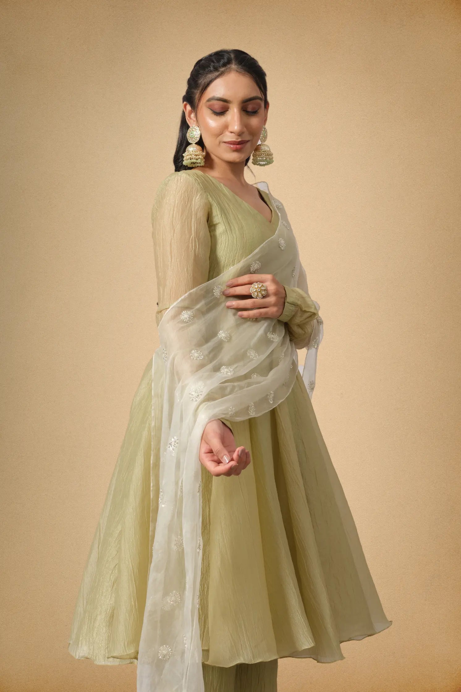 Elegant olive green ethnic suit with flared silhouette