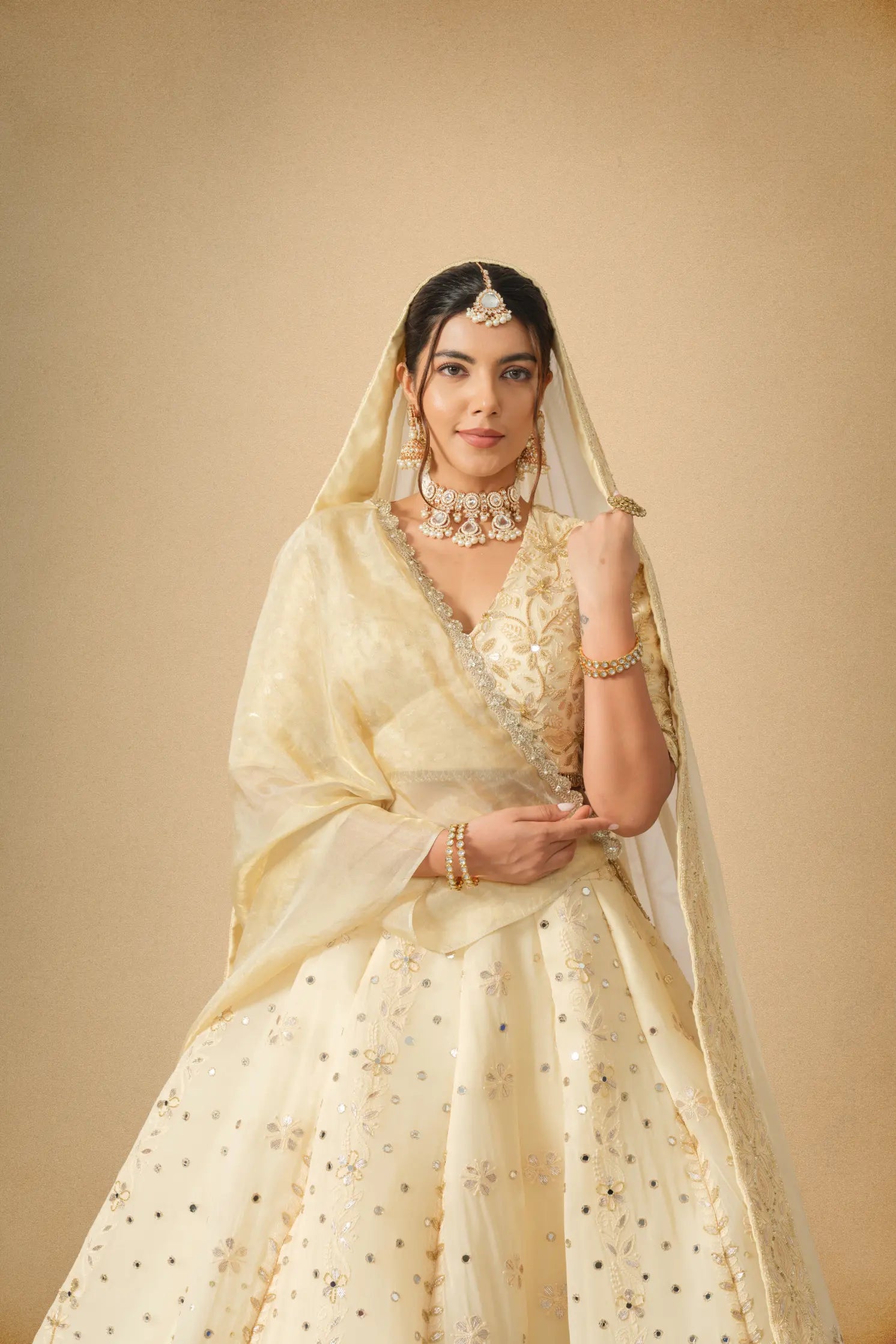 Golden bridal lehenga set with elegant dupatta