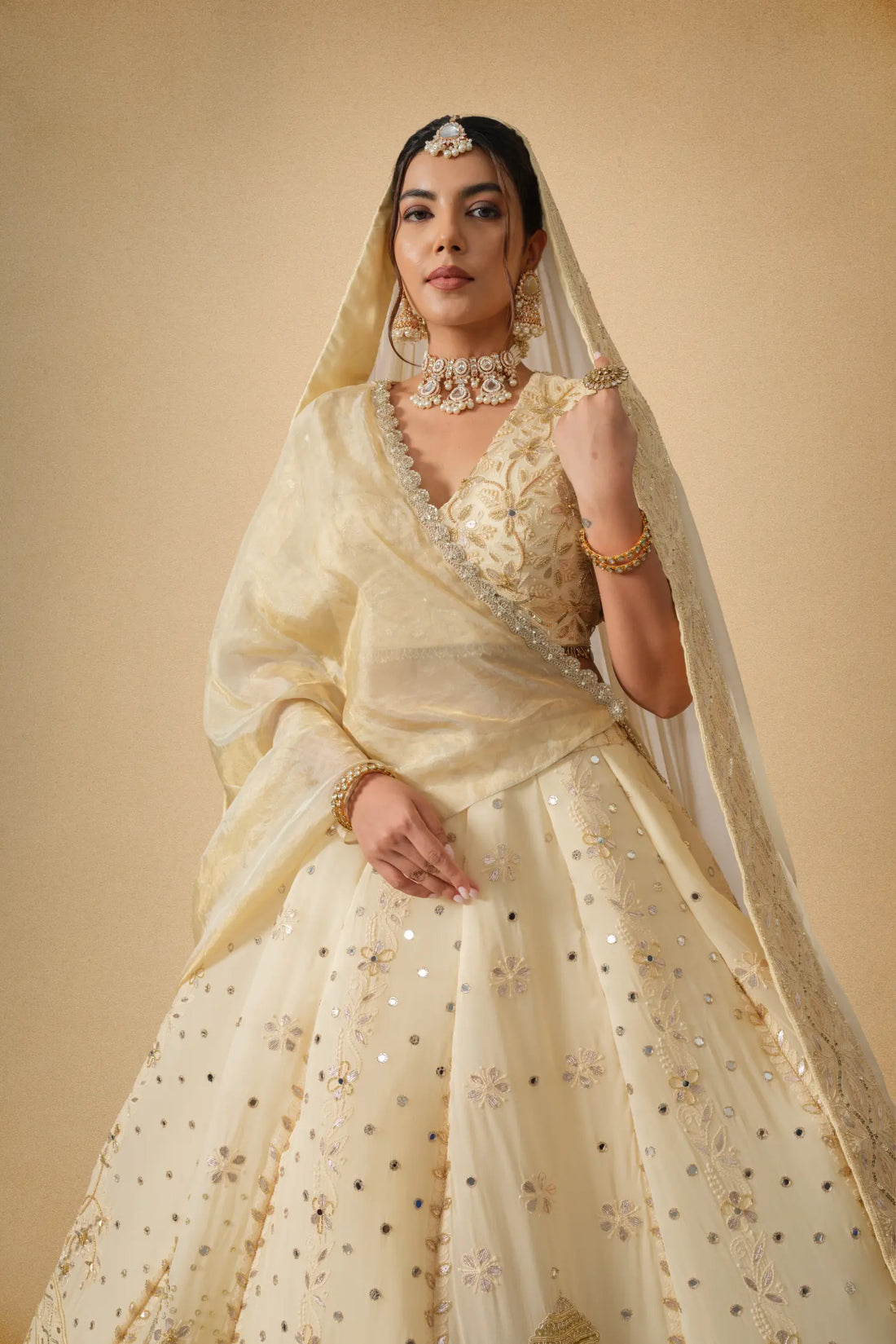 Golden designer lehenga set with dupatta front view