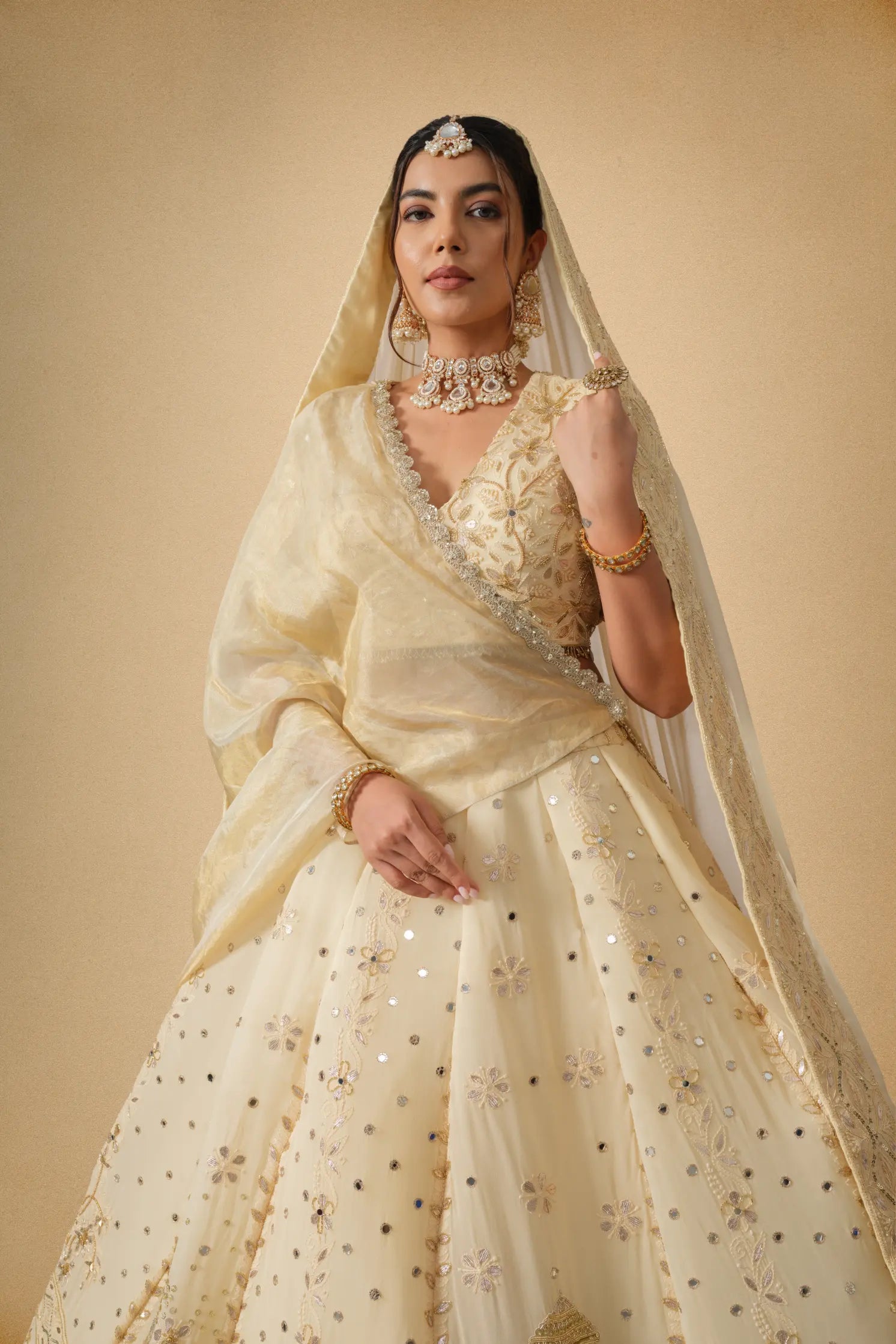 Golden designer lehenga set with dupatta front view