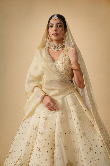 Golden designer lehenga set with dupatta front view