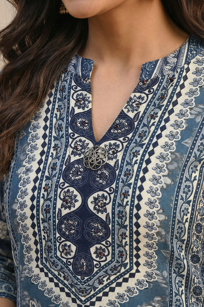 Woman wearing indigo printed kurta set with dupatta and straight pants in elegant ethnic festive wear