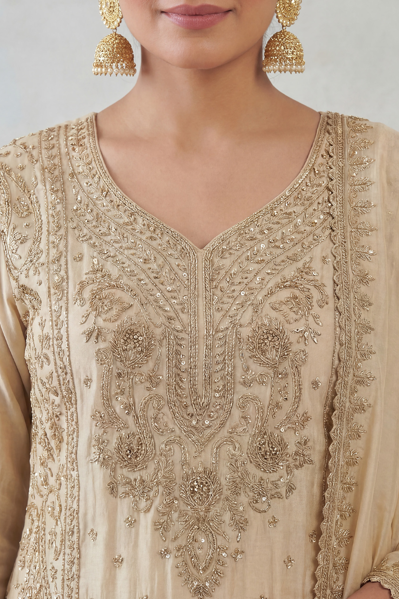 Close look of ivory gold embroidered kurta design