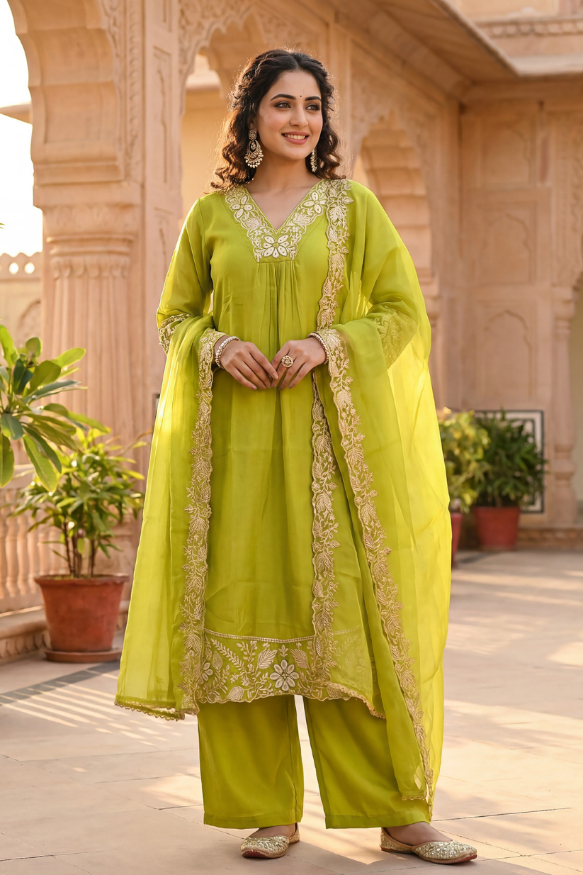 Woman wearing lime green embroidered kurta set with dupatta and straight pants for festive ethnic wear