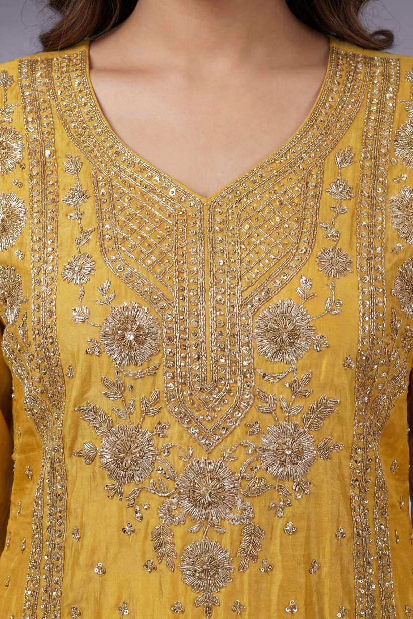 Women mustard yellow embroidered kurta sharara set with dupatta front view