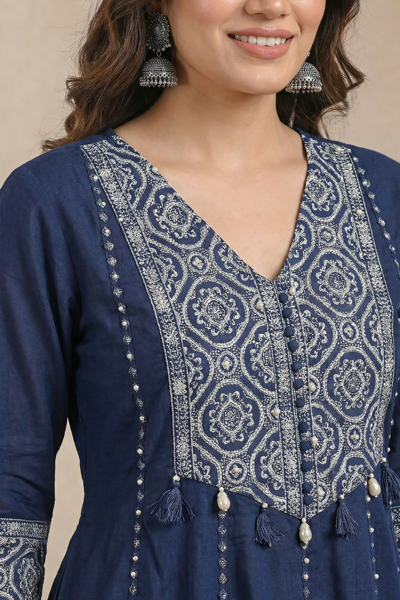Woman wearing navy blue embroidered kurta pant set with matching dupatta for festive and traditional wear