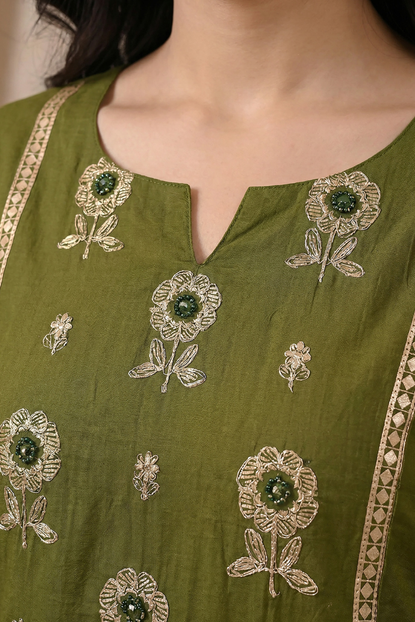 Woman wearing olive green embroidered cotton kurta set with printed palazzo pants and dupatta for festive ethnic wear