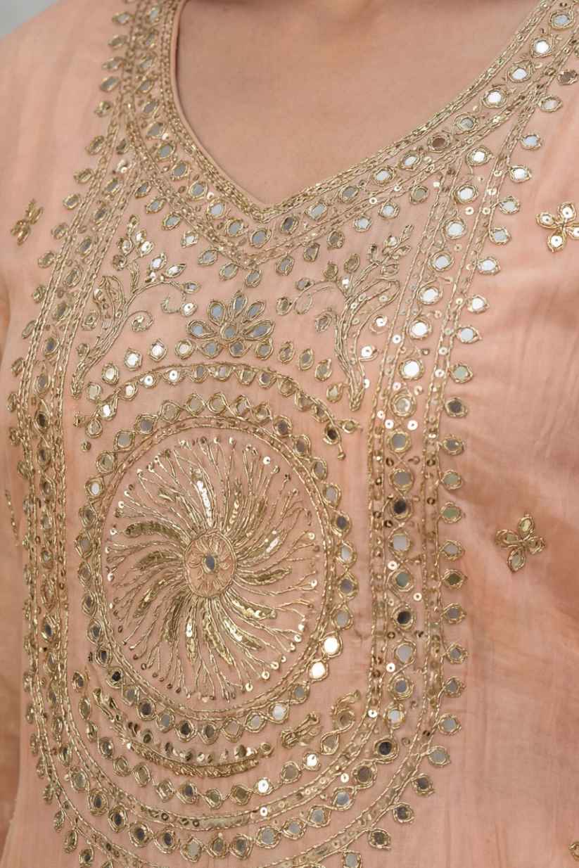 Women peach embroidered kurta palazzo set with dupatta front view