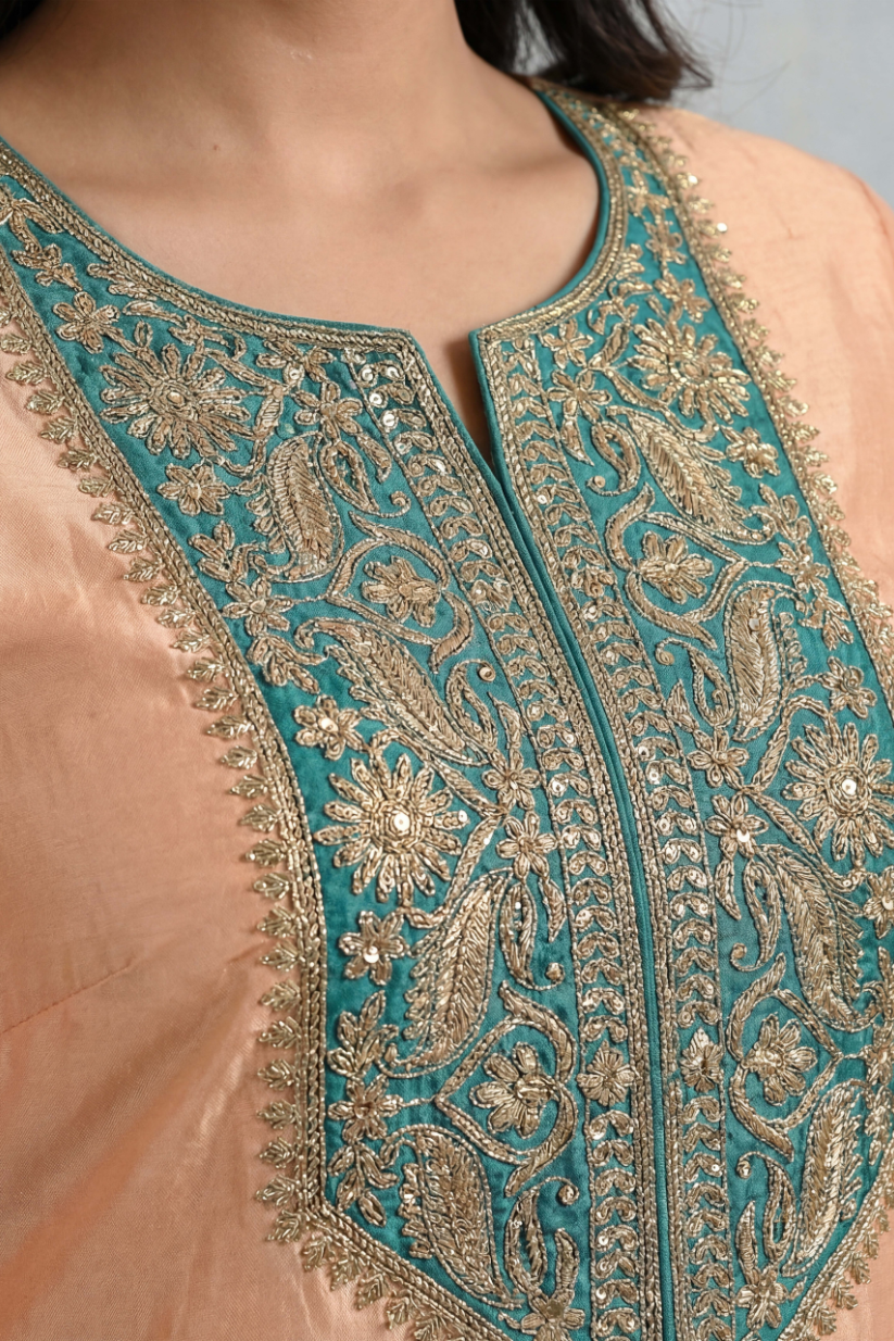 Women peach teal embroidered kurta pant set with dupatta front view
