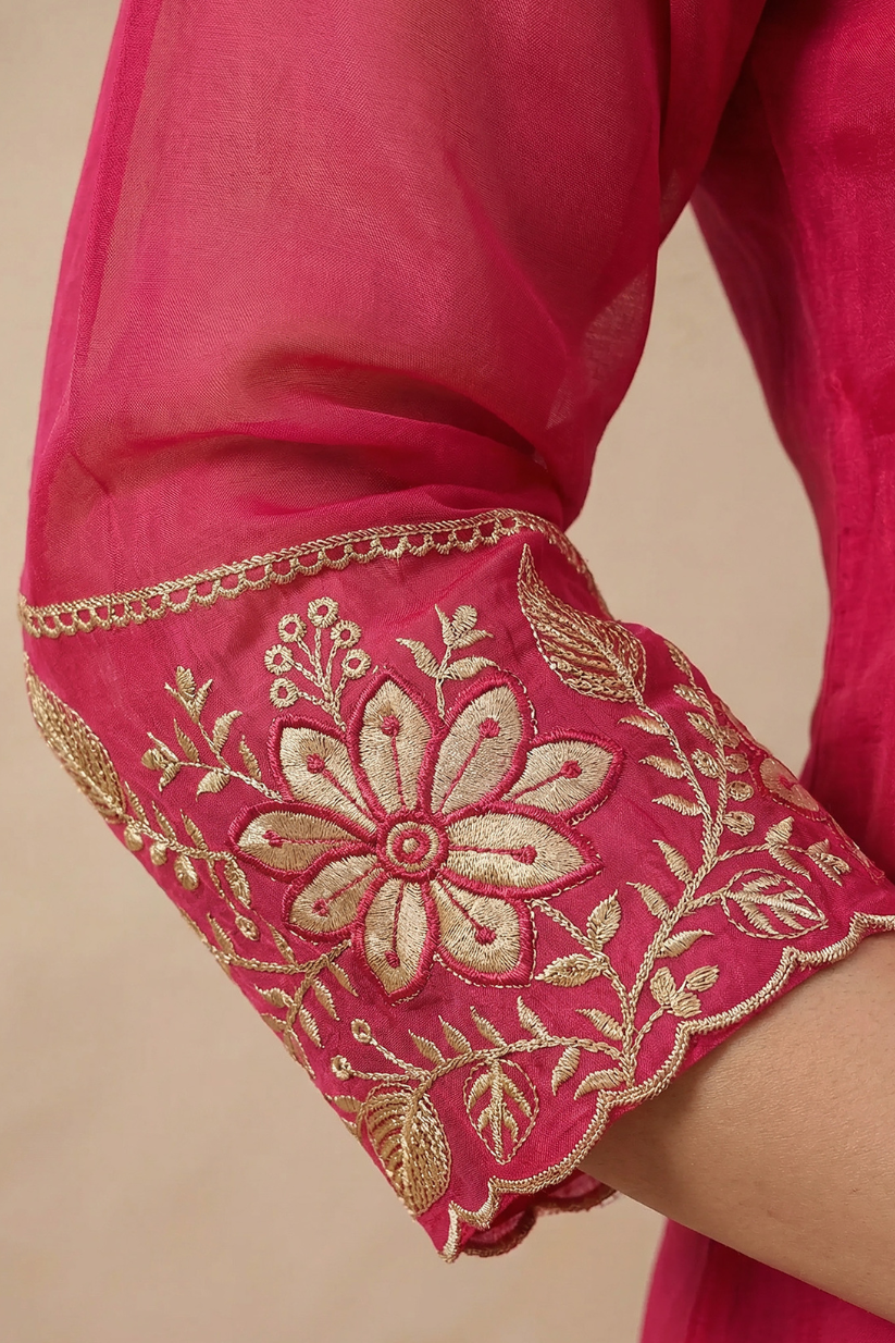 Detailed floral embroidery on sleeve border of pink festive kurta