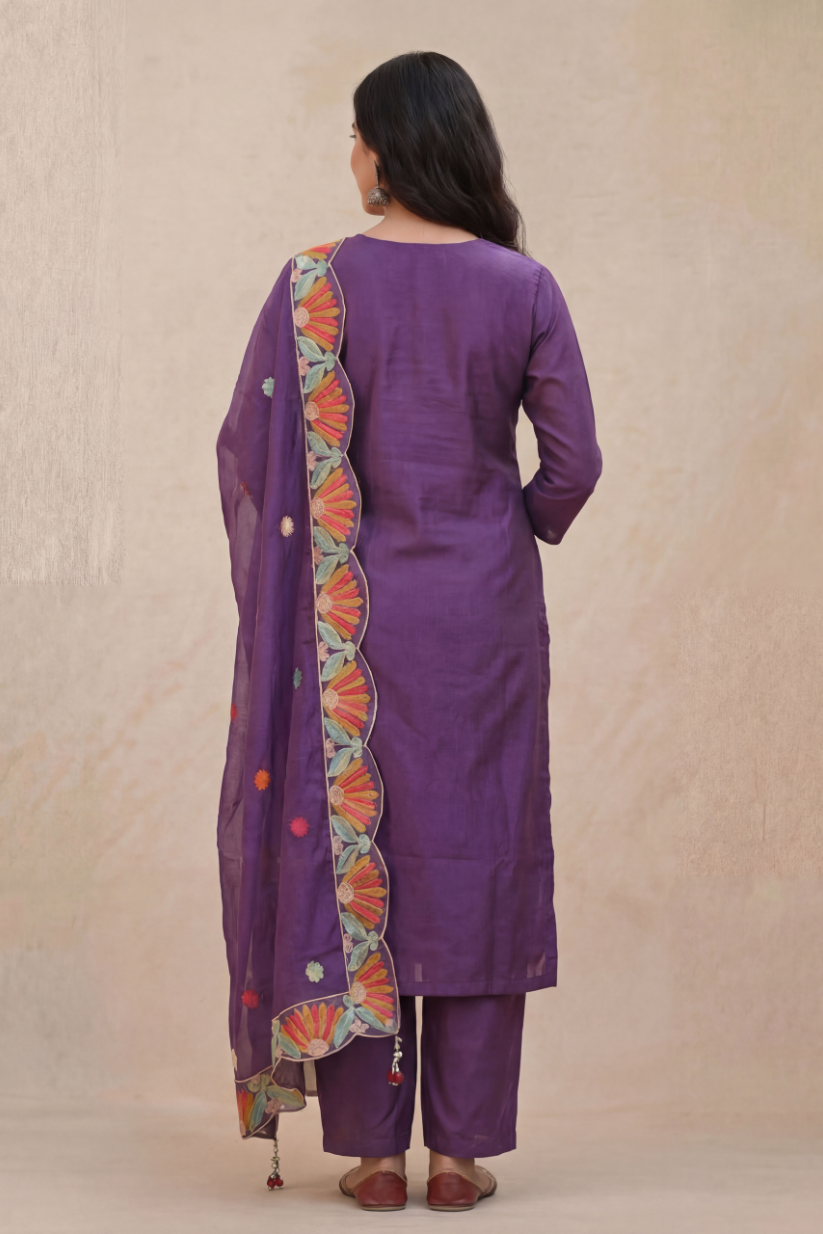 Back view of purple embroidered kurta set with matching pants and dupatta