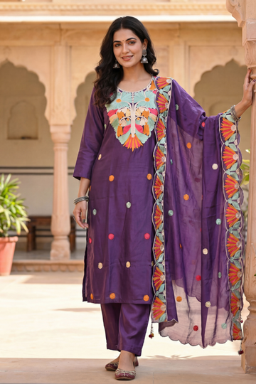 Woman wearing purple embroidered kurta set with statement dupatta for festive ethnic wear