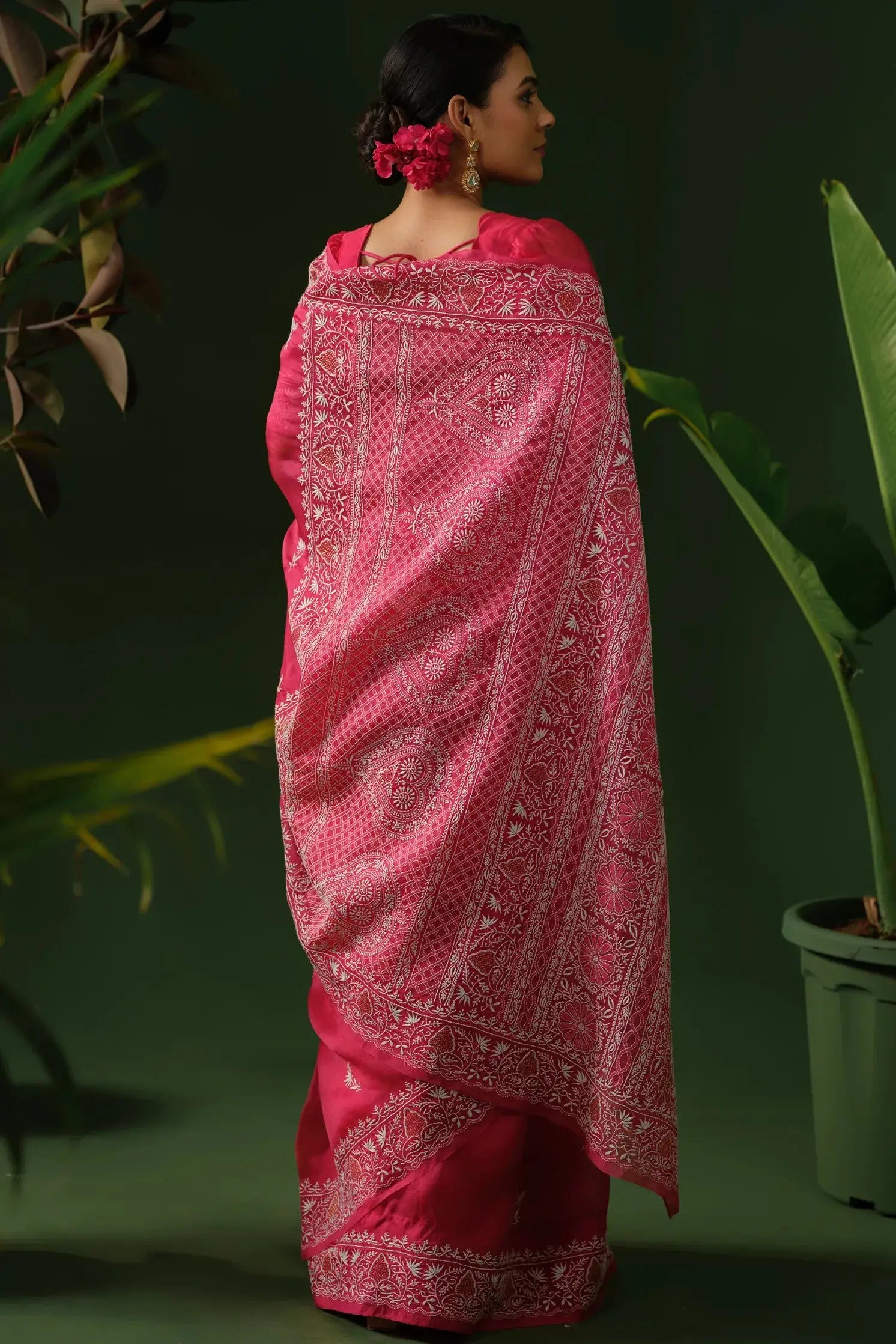 Back view of rani pink chikankari saree with blouse