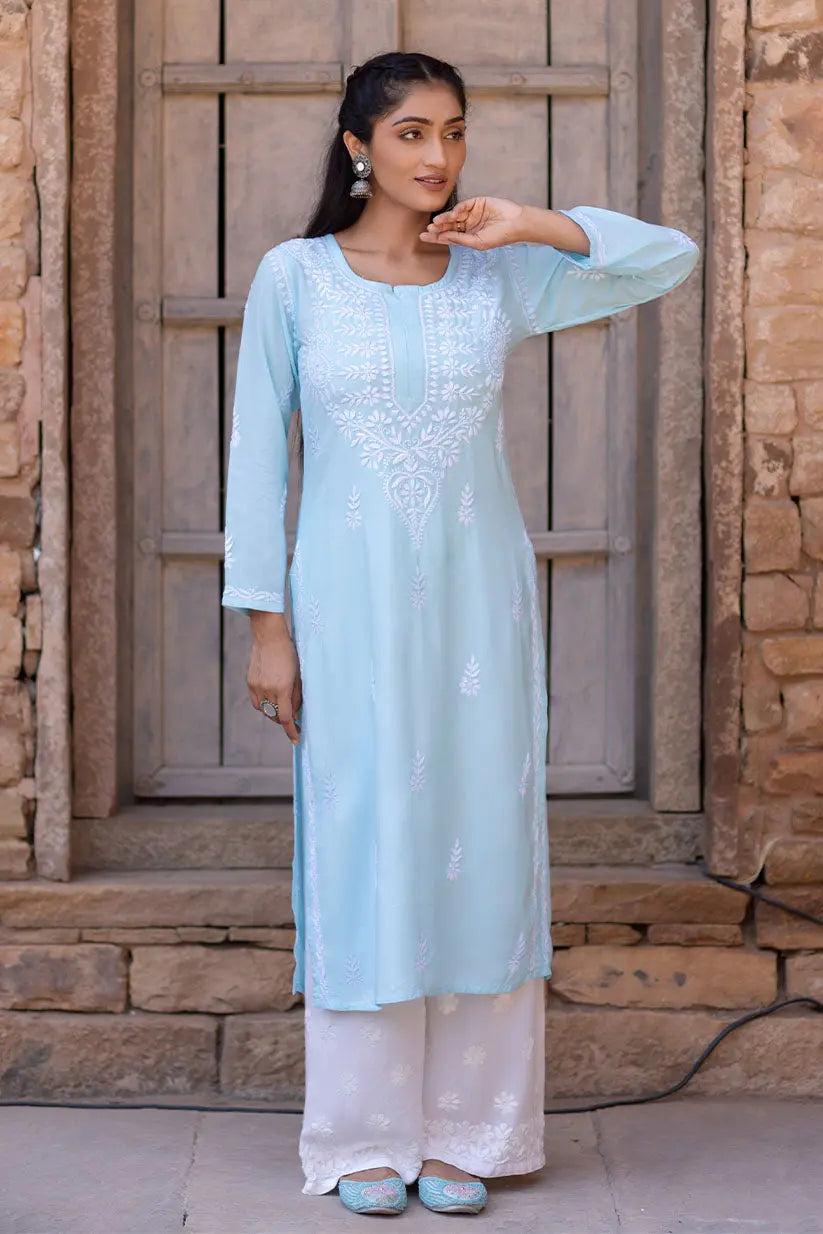 Women wearing sky blue straight fit ethnic kurti side pose