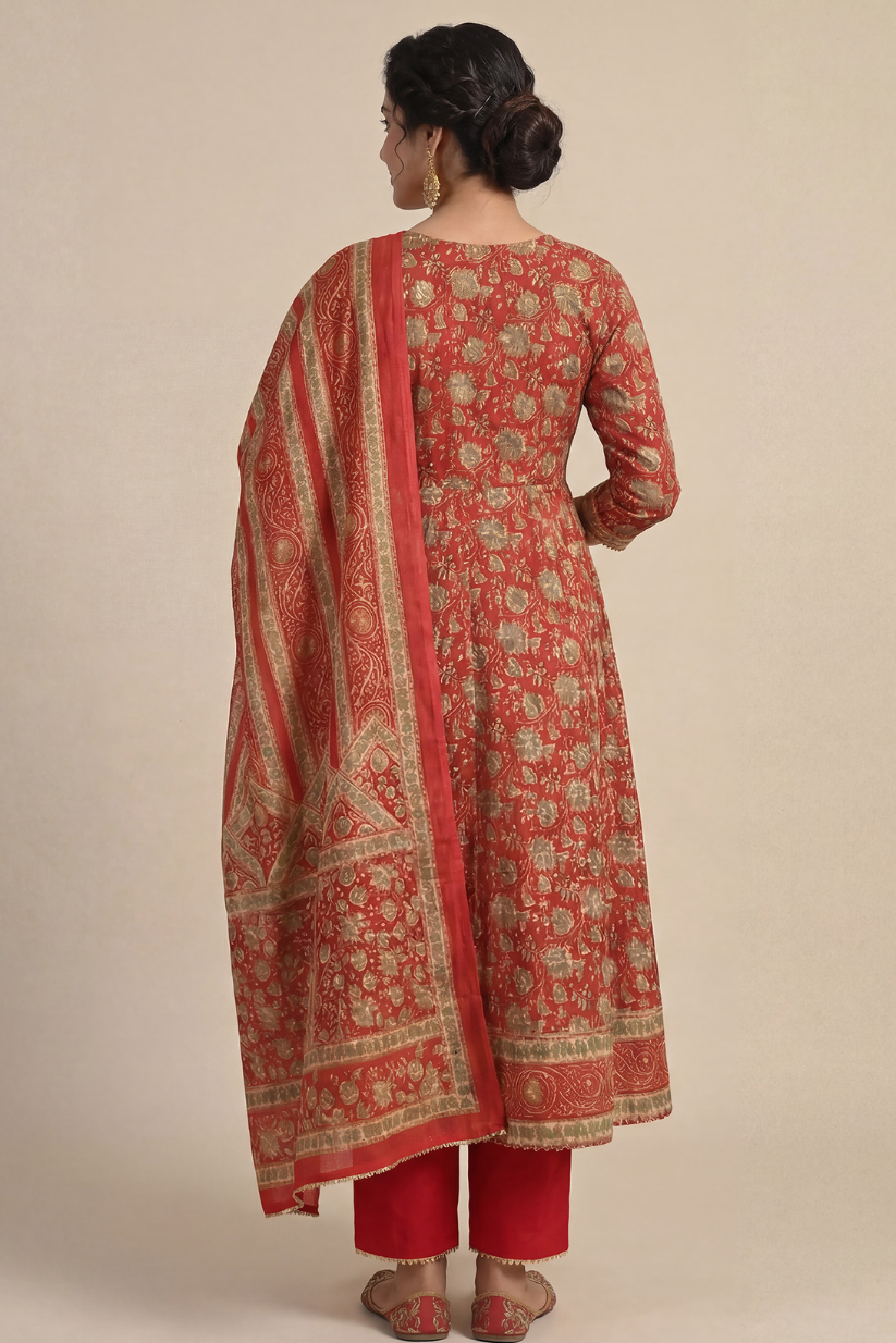 Back view of red printed Anarkali kurta set with dupatta featuring traditional floral motifs, ethnic border detailing, and festive Indian ethnic wear styling for women