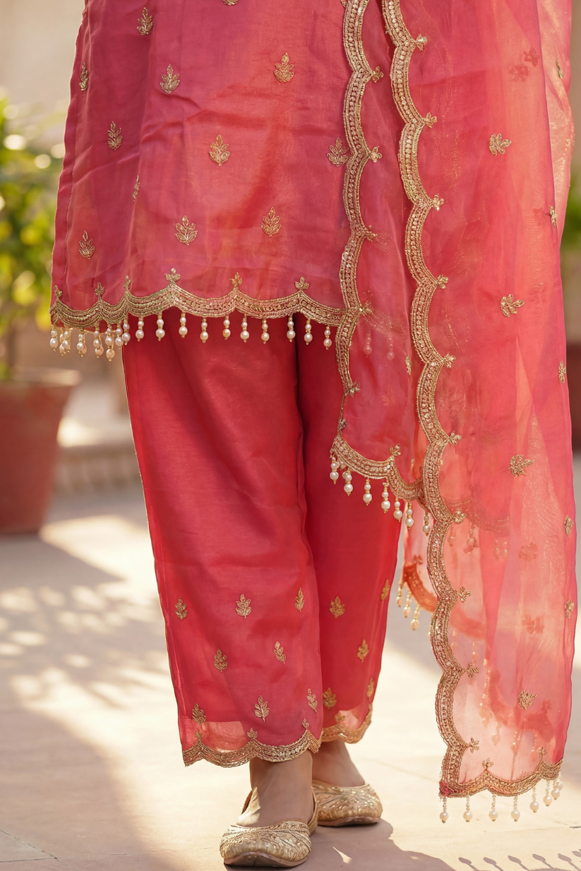 Detailed embroidered border design on rose pink ethnic pants