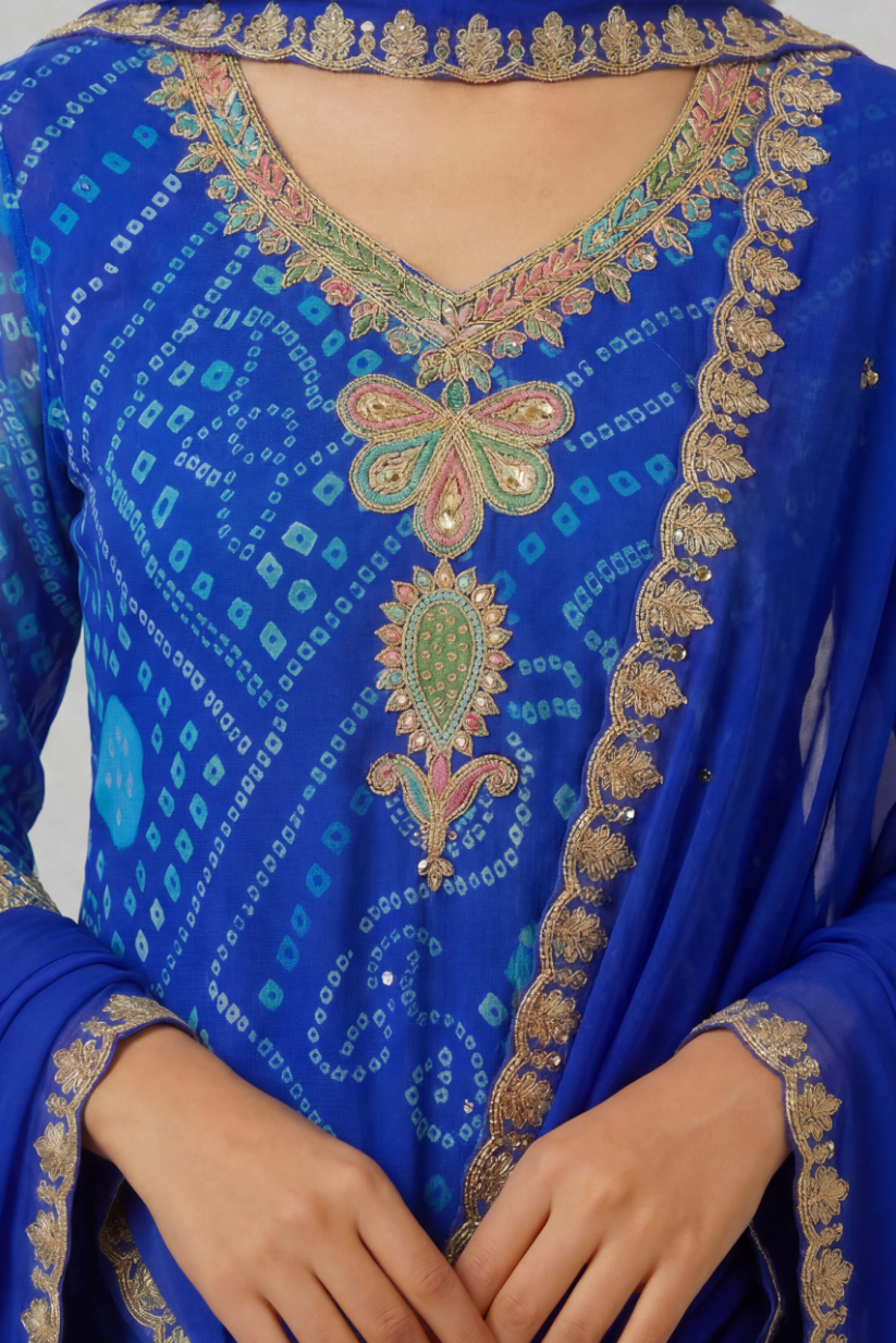 Close up of royal blue embroidered kurta neckline with intricate ethnic embroidery and dupatta detail for women festive wear