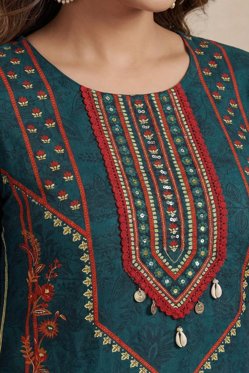 Woman wearing teal green printed kurta set with Patiala pants and dupatta front view