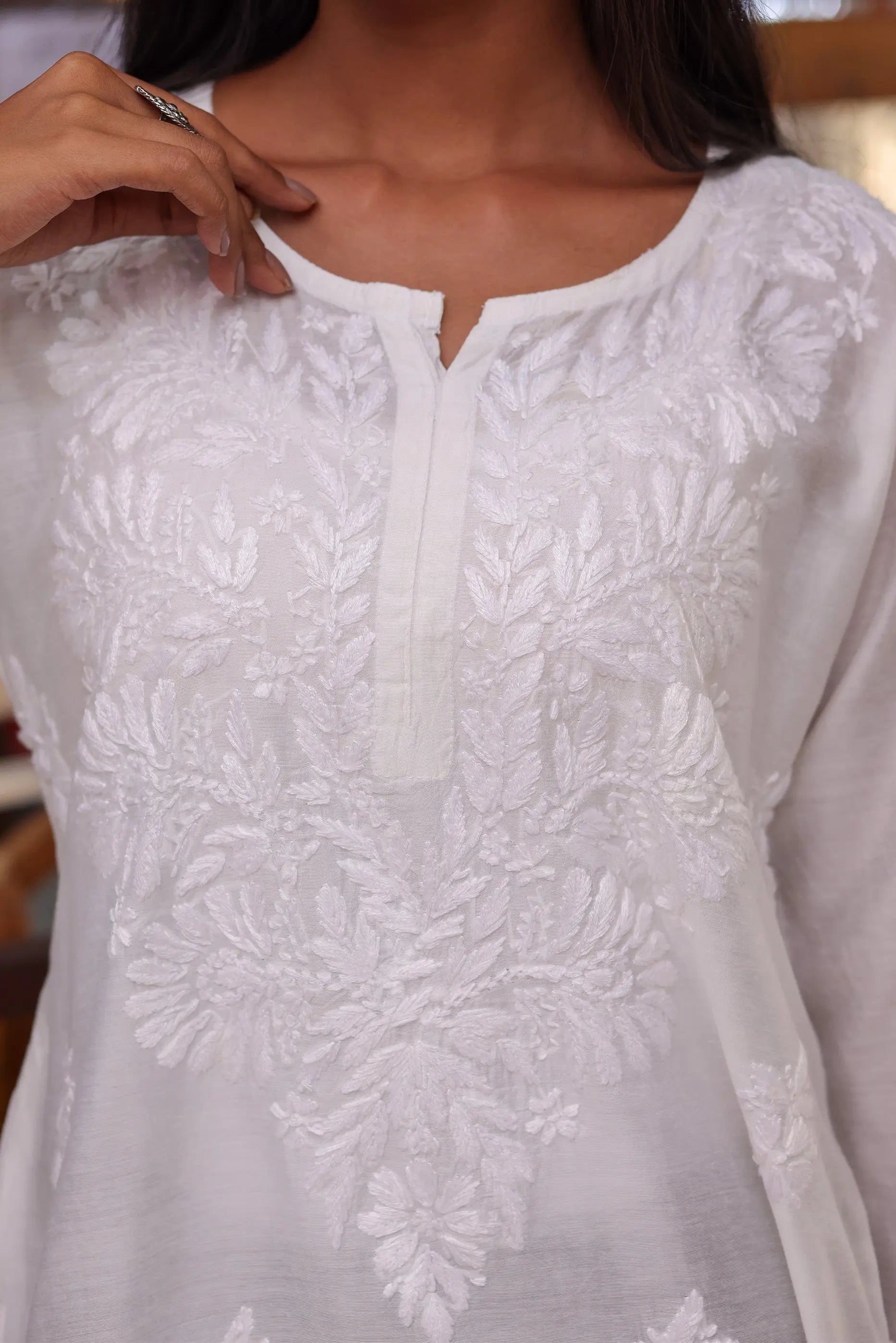 White Chikankari Embroidery Closeup on Short Kurti