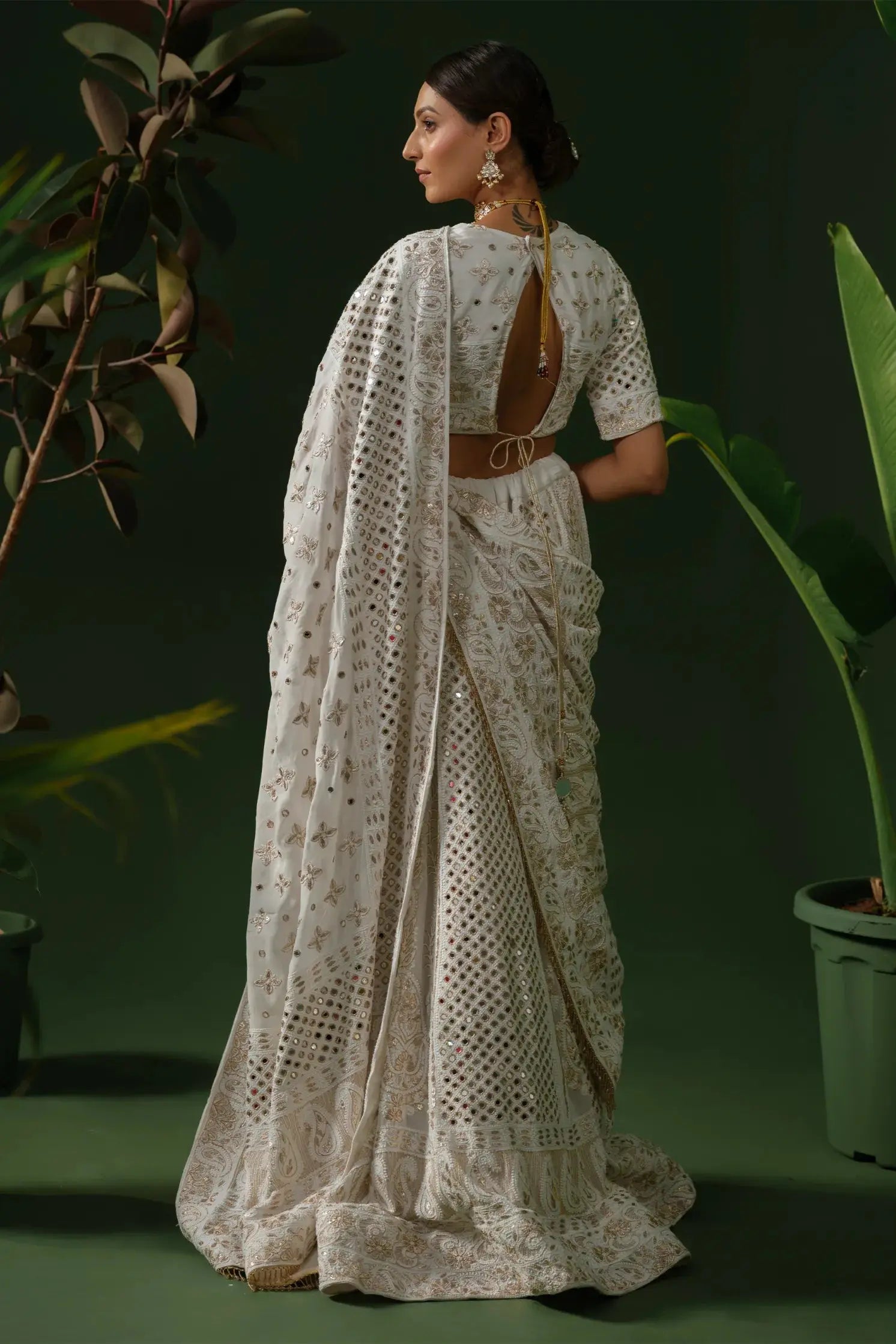 Back view of white chikankari lehenga with dupatta