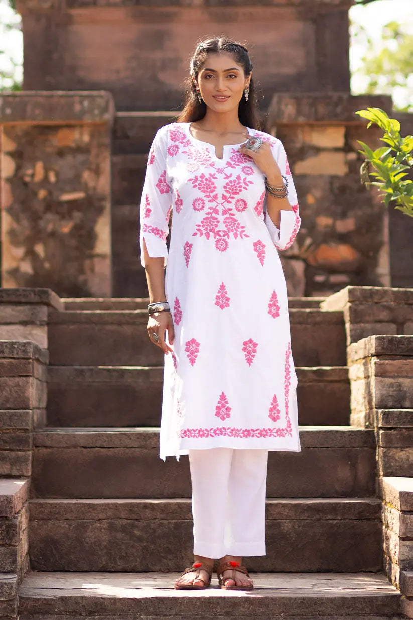 White straight kurti with pink Chikankari embroidery for women front view