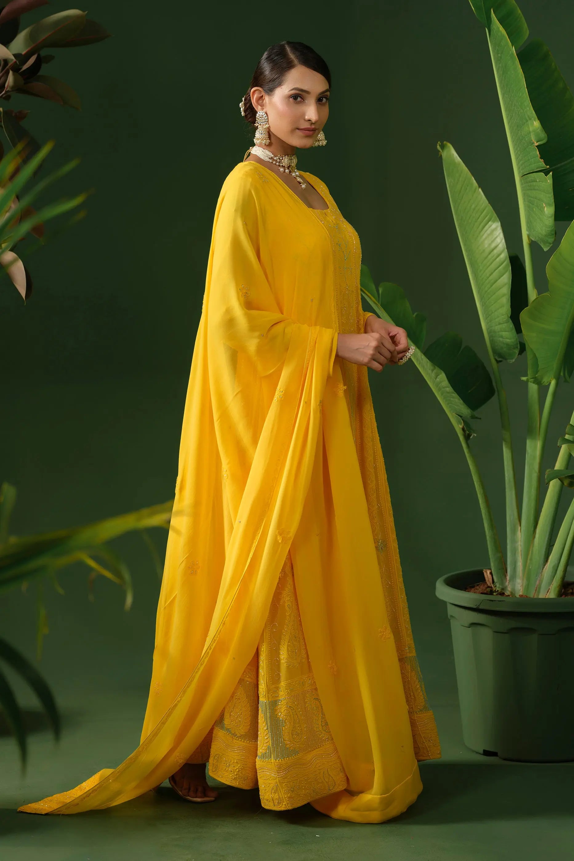 Yellow party wear Anarkali suit with matching dupatta